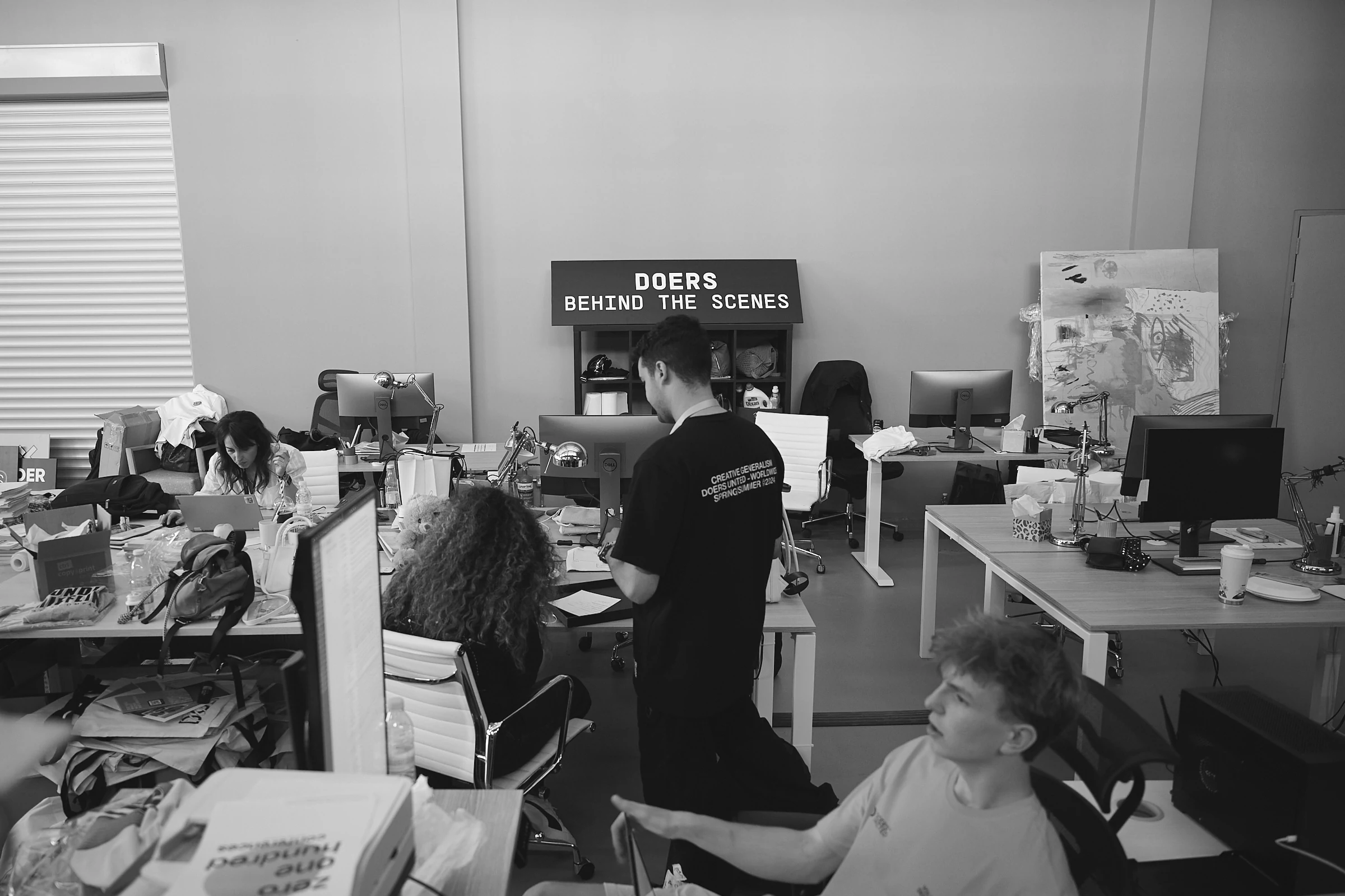 The team at work in the Limassol office, in black and white